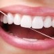 utilizzo filo interdentale studio dentistico motta rossi milano centro